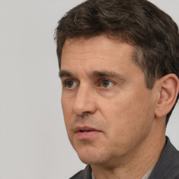 Neutral white adult male with short  brown hair and brown eyes