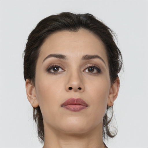 Neutral asian young-adult female with medium  brown hair and brown eyes