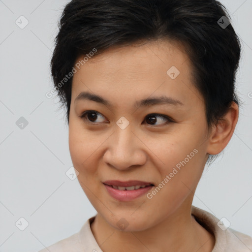 Joyful asian young-adult female with short  brown hair and brown eyes