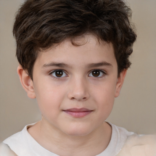 Joyful white child male with short  brown hair and brown eyes