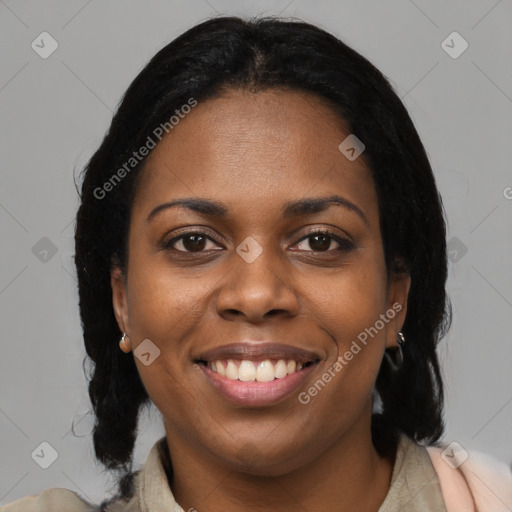 Joyful black young-adult female with medium  black hair and brown eyes