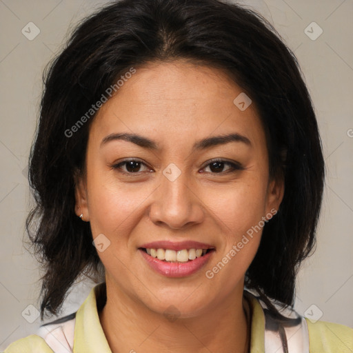 Joyful latino young-adult female with medium  brown hair and brown eyes