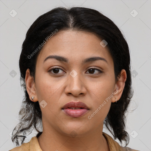 Joyful latino young-adult female with medium  brown hair and brown eyes