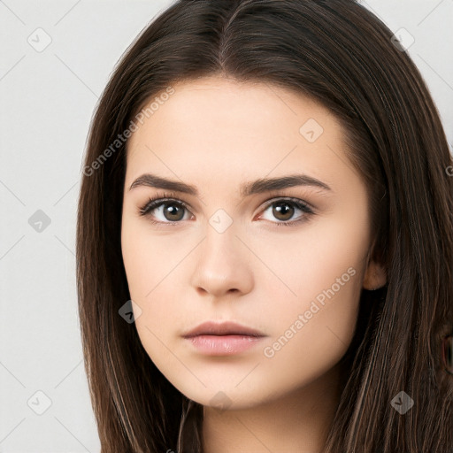 Neutral white young-adult female with long  brown hair and brown eyes