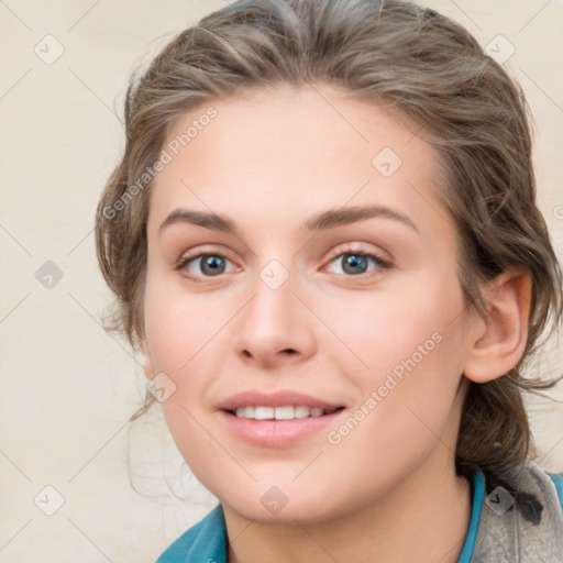 Joyful white young-adult female with medium  brown hair and blue eyes