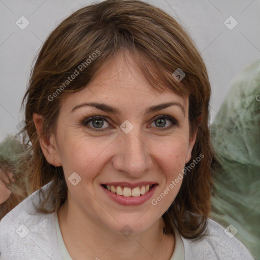 Joyful white young-adult female with medium  brown hair and blue eyes