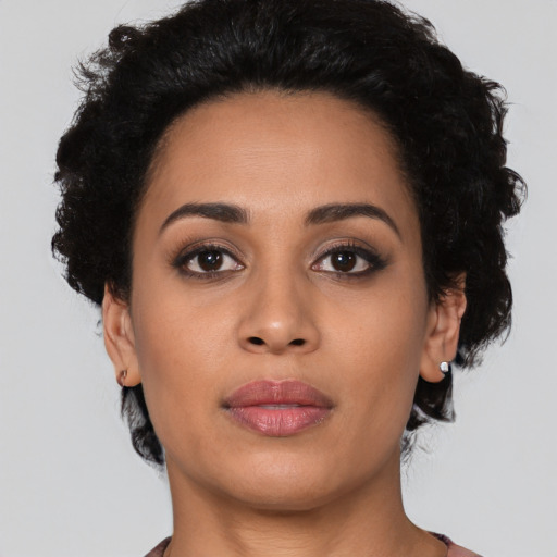 Neutral latino young-adult female with medium  black hair and brown eyes