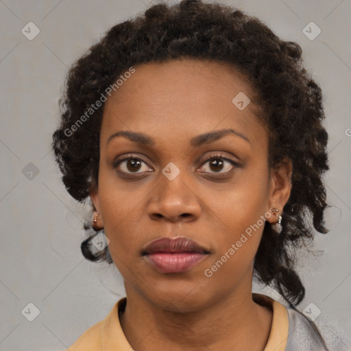 Neutral black young-adult female with medium  brown hair and brown eyes