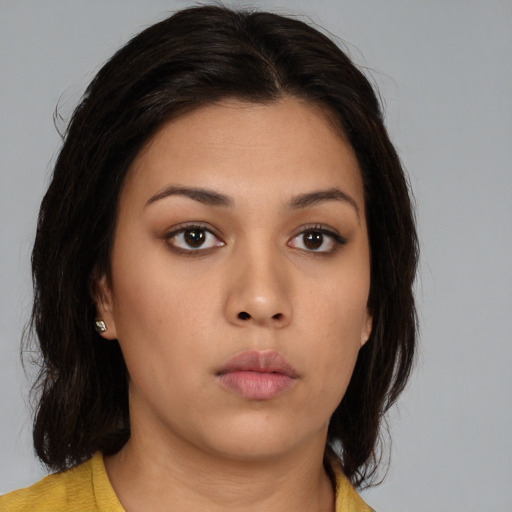 Neutral asian young-adult female with medium  brown hair and brown eyes