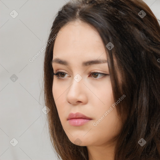 Neutral white young-adult female with long  brown hair and brown eyes