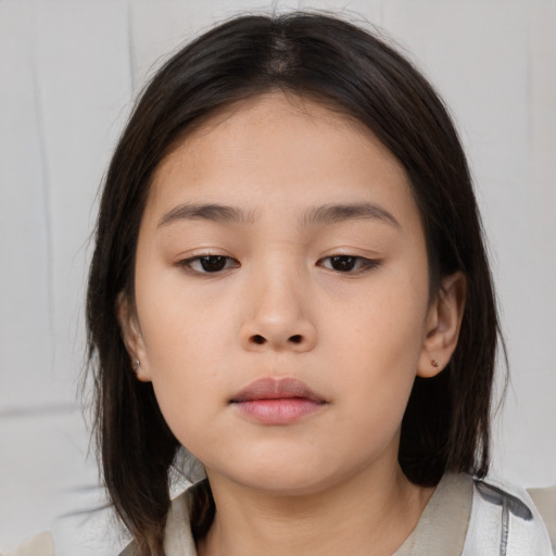 Neutral asian child female with medium  brown hair and brown eyes