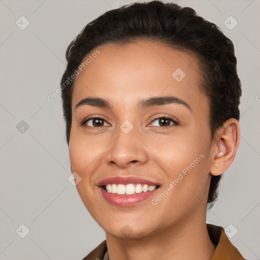 Joyful white young-adult female with short  brown hair and brown eyes