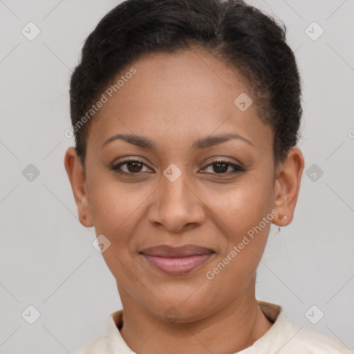 Joyful latino young-adult female with short  brown hair and brown eyes