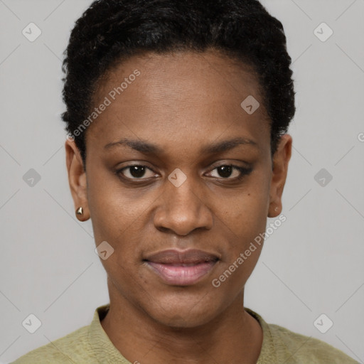 Joyful black young-adult female with short  black hair and brown eyes