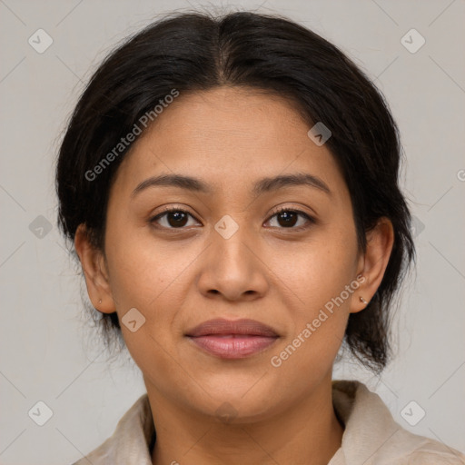 Joyful latino young-adult female with medium  brown hair and brown eyes