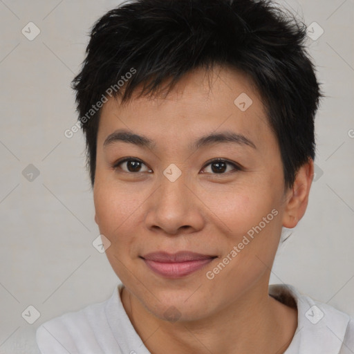 Joyful asian young-adult female with short  brown hair and brown eyes