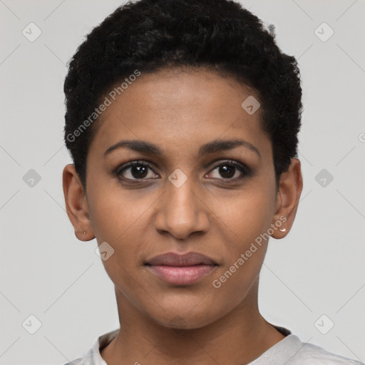 Joyful black young-adult female with short  black hair and brown eyes