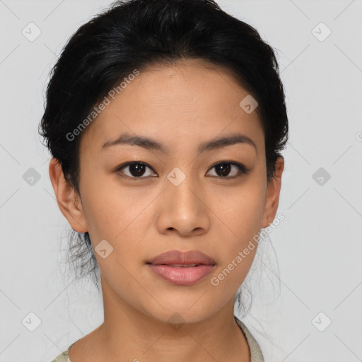 Joyful asian young-adult female with short  black hair and brown eyes