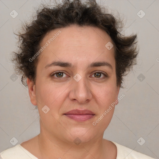 Joyful white adult female with short  brown hair and brown eyes