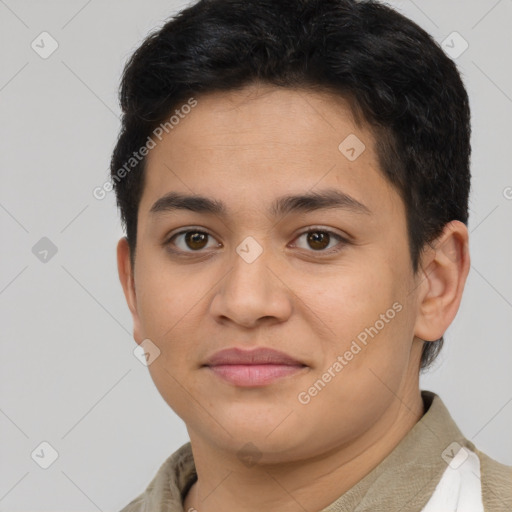 Joyful latino young-adult male with short  brown hair and brown eyes