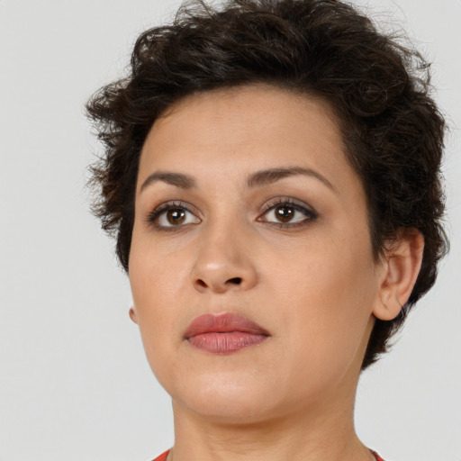 Neutral white young-adult female with short  brown hair and brown eyes