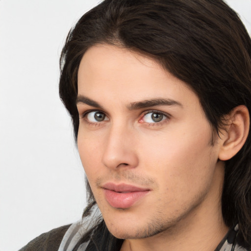 Neutral white young-adult male with medium  brown hair and brown eyes