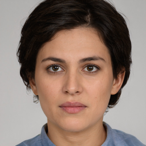 Neutral white young-adult female with medium  brown hair and brown eyes
