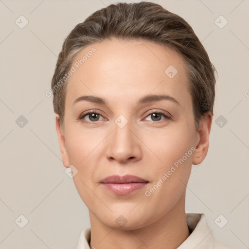 Joyful white young-adult female with short  brown hair and brown eyes