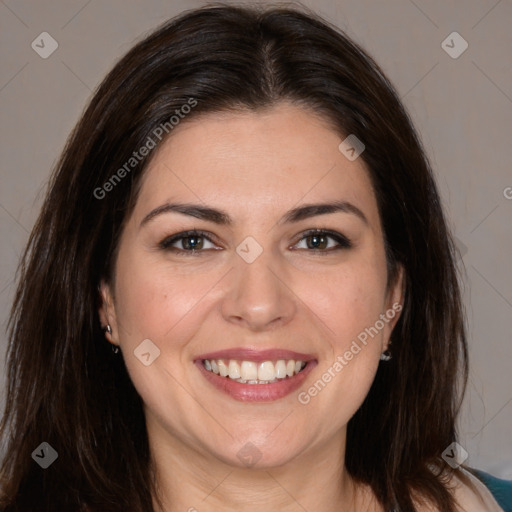 Joyful white young-adult female with long  brown hair and brown eyes