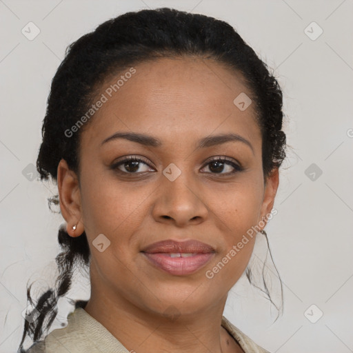 Joyful black young-adult female with medium  brown hair and brown eyes