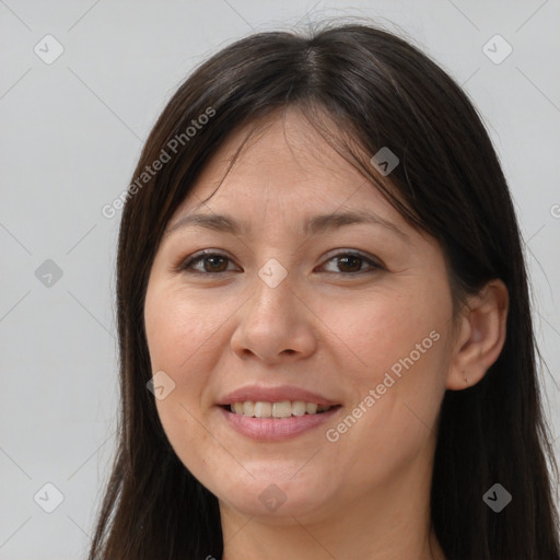 Joyful white young-adult female with long  brown hair and brown eyes