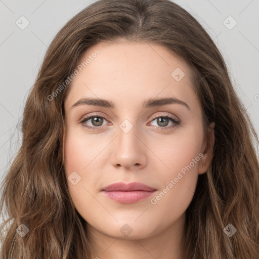 Joyful white young-adult female with long  brown hair and green eyes