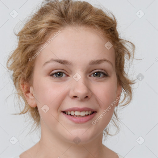 Joyful white young-adult female with medium  brown hair and blue eyes