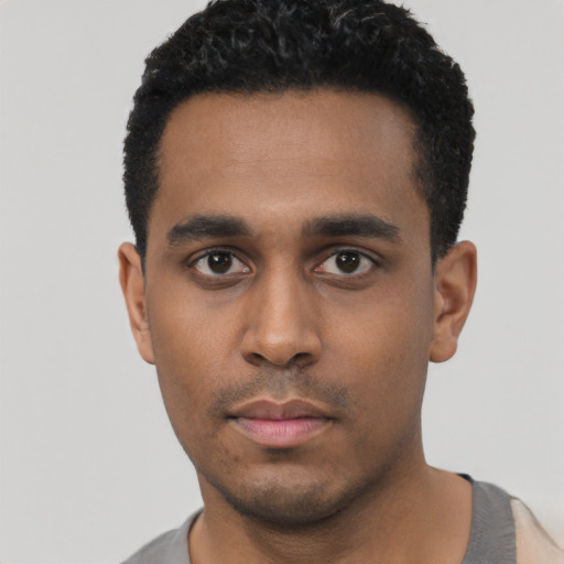 Neutral black young-adult male with short  black hair and brown eyes