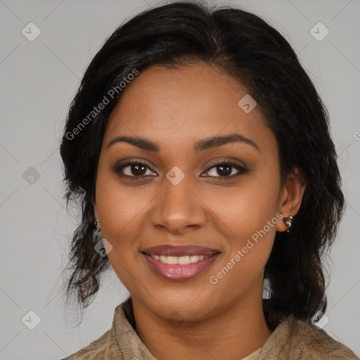 Joyful black young-adult female with medium  brown hair and brown eyes