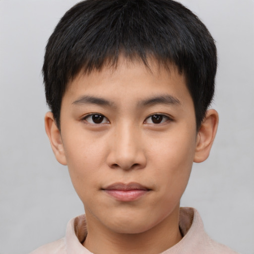 Neutral asian child male with short  brown hair and brown eyes