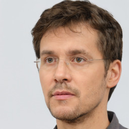 Neutral white adult male with short  brown hair and brown eyes