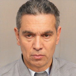 Neutral white middle-aged male with short  black hair and brown eyes