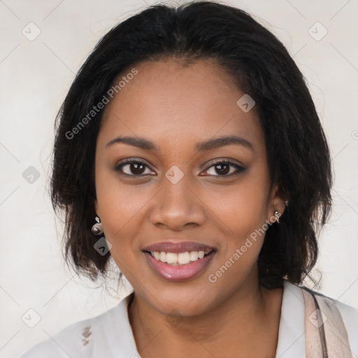 Joyful black young-adult female with long  brown hair and brown eyes