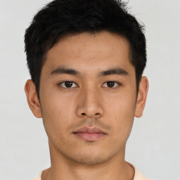 Neutral asian young-adult male with short  black hair and brown eyes