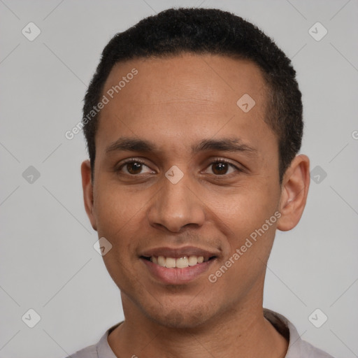 Joyful latino young-adult male with short  black hair and brown eyes