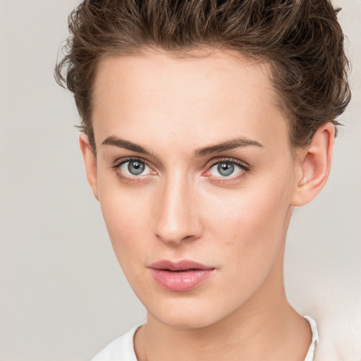 Neutral white young-adult female with short  brown hair and brown eyes