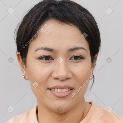 Joyful asian young-adult female with short  brown hair and brown eyes