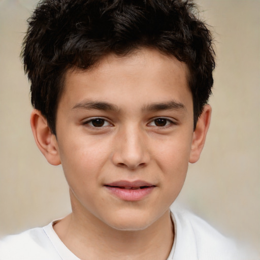 Joyful white child male with short  brown hair and brown eyes