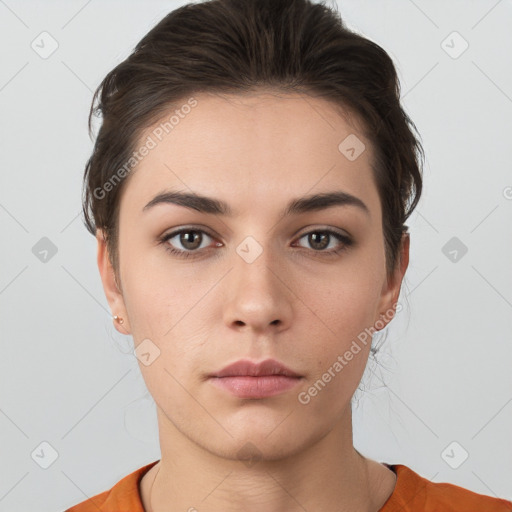 Neutral white young-adult female with short  brown hair and brown eyes