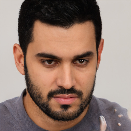 Neutral white young-adult male with short  black hair and brown eyes