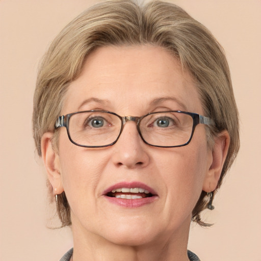 Joyful white middle-aged female with medium  brown hair and blue eyes