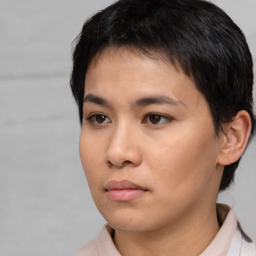 Neutral white young-adult female with short  black hair and brown eyes