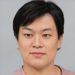 Neutral asian young-adult male with short  brown hair and brown eyes