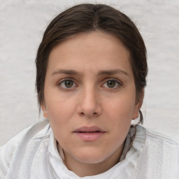 Neutral white young-adult female with short  brown hair and brown eyes